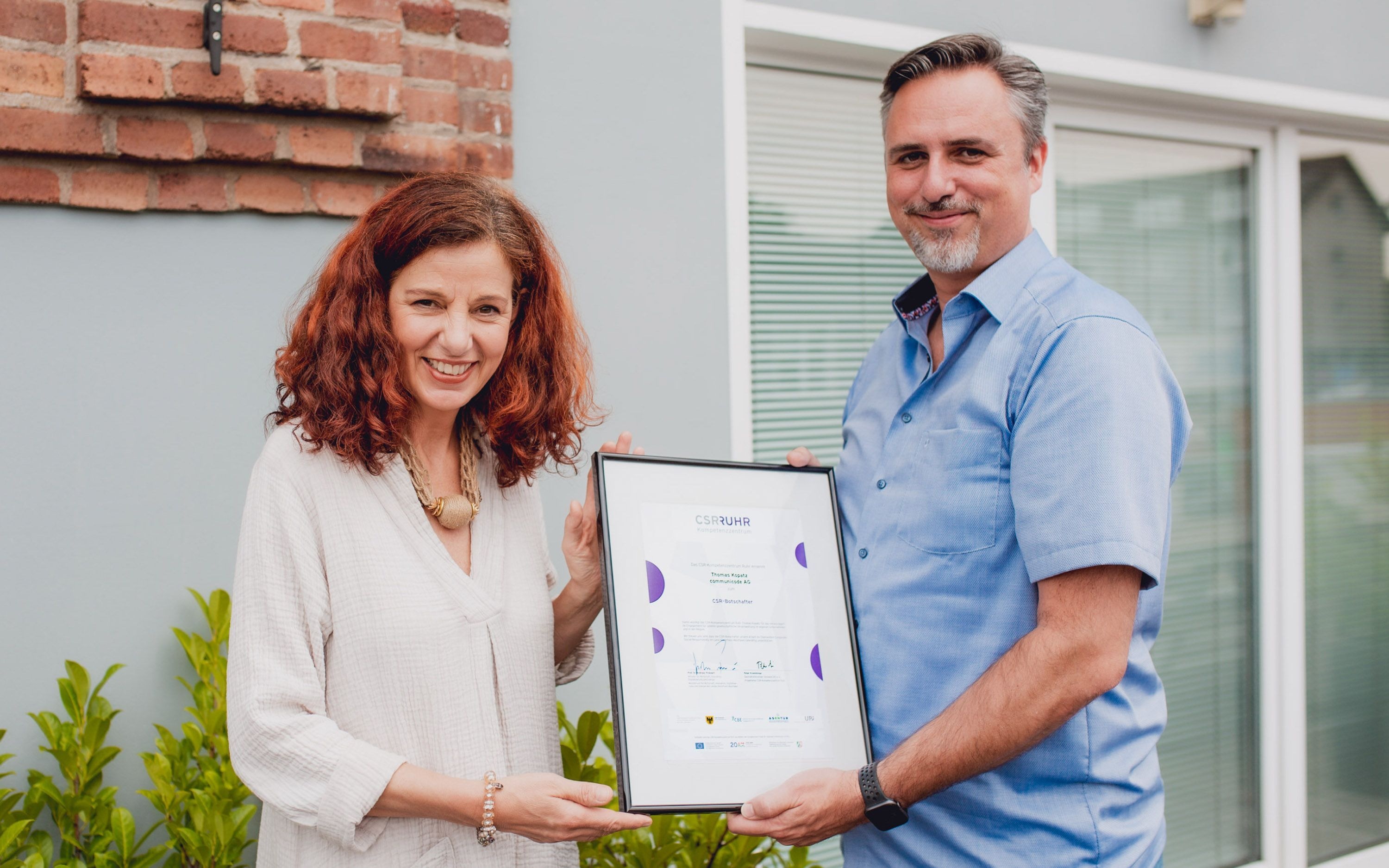 Foto mit Thomas Kopatz bei der Zertifikatsübergange zum CSR-Botschafter