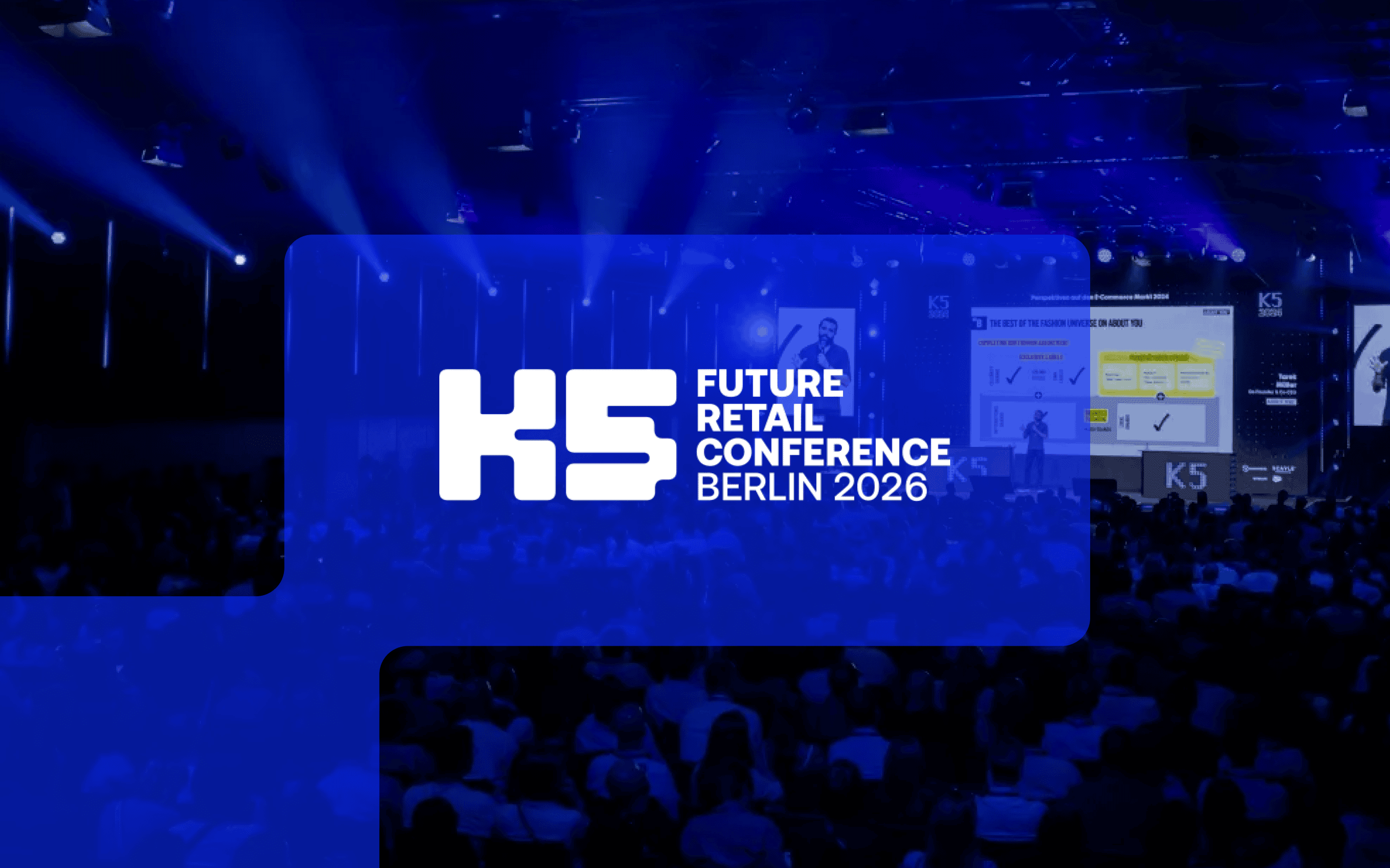 A large conference stage with blue lighting and an audience in the hall; in the foreground, the logo “K5 Future Retail Conference Berlin 2026”