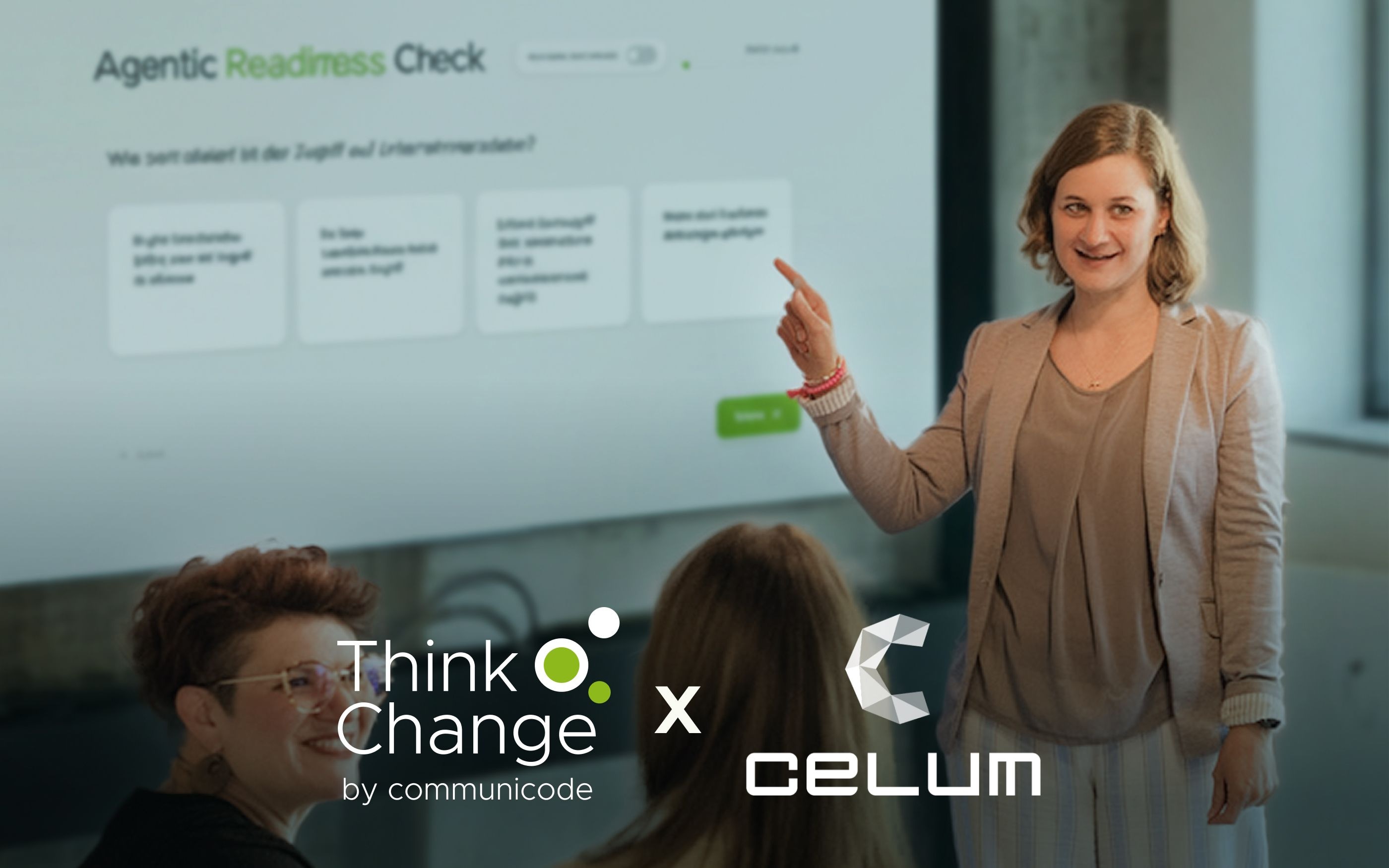 A person stands in front of a presentation slide titled “Agentic Readiness Check” and points to the answer choices for a question about AI use in the company. In the foreground, participants are seated and looking at the screen in a modern seminar or meeting room.